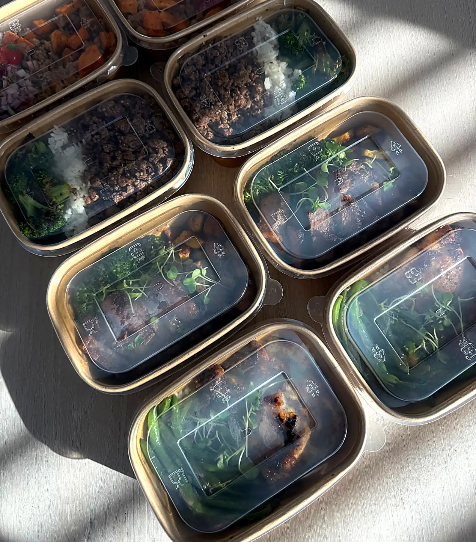 Sealed meal-prep containers lined up